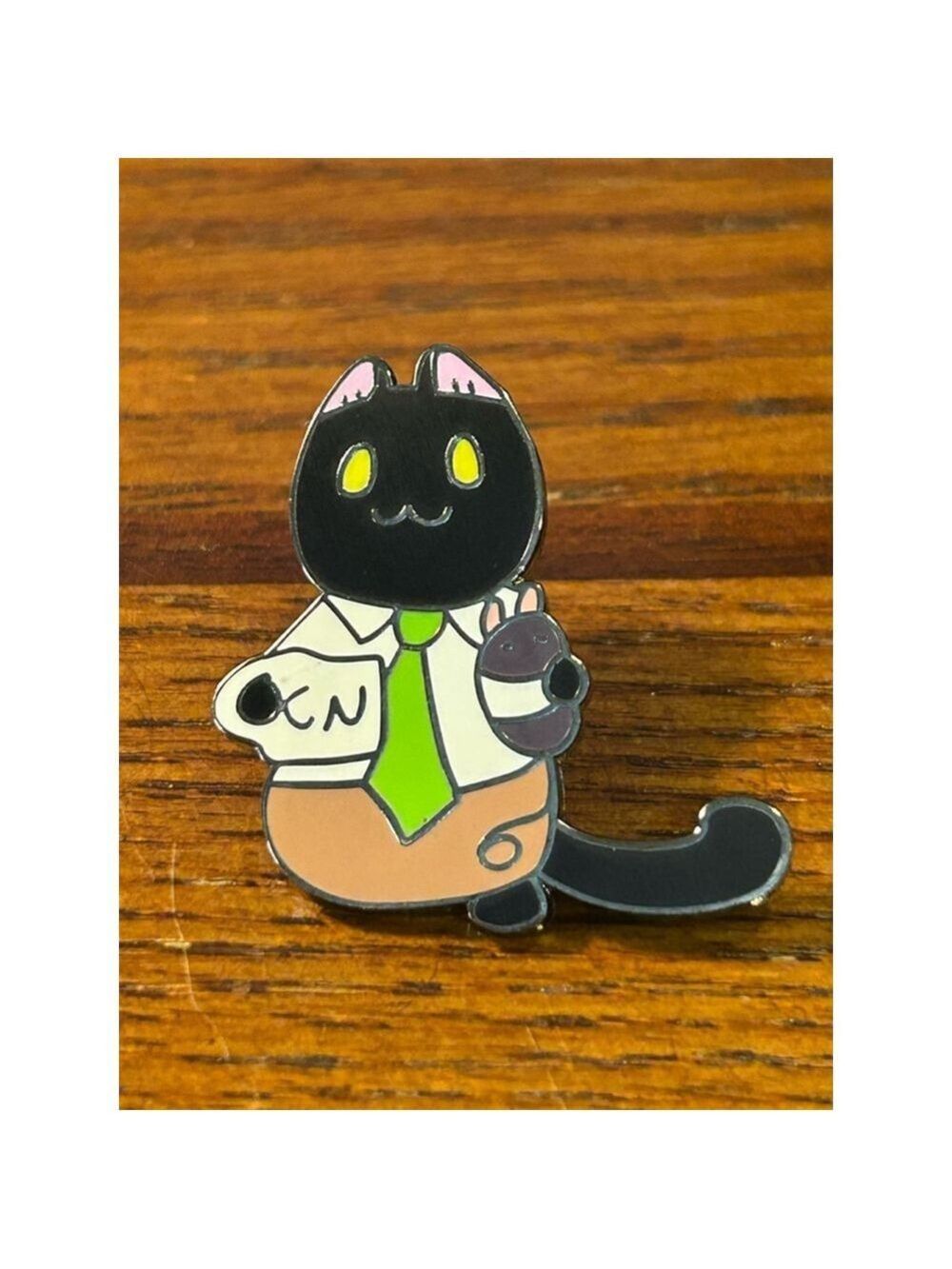 Breaking Cats
Puck work clothes
Unisex Pin Black and Green